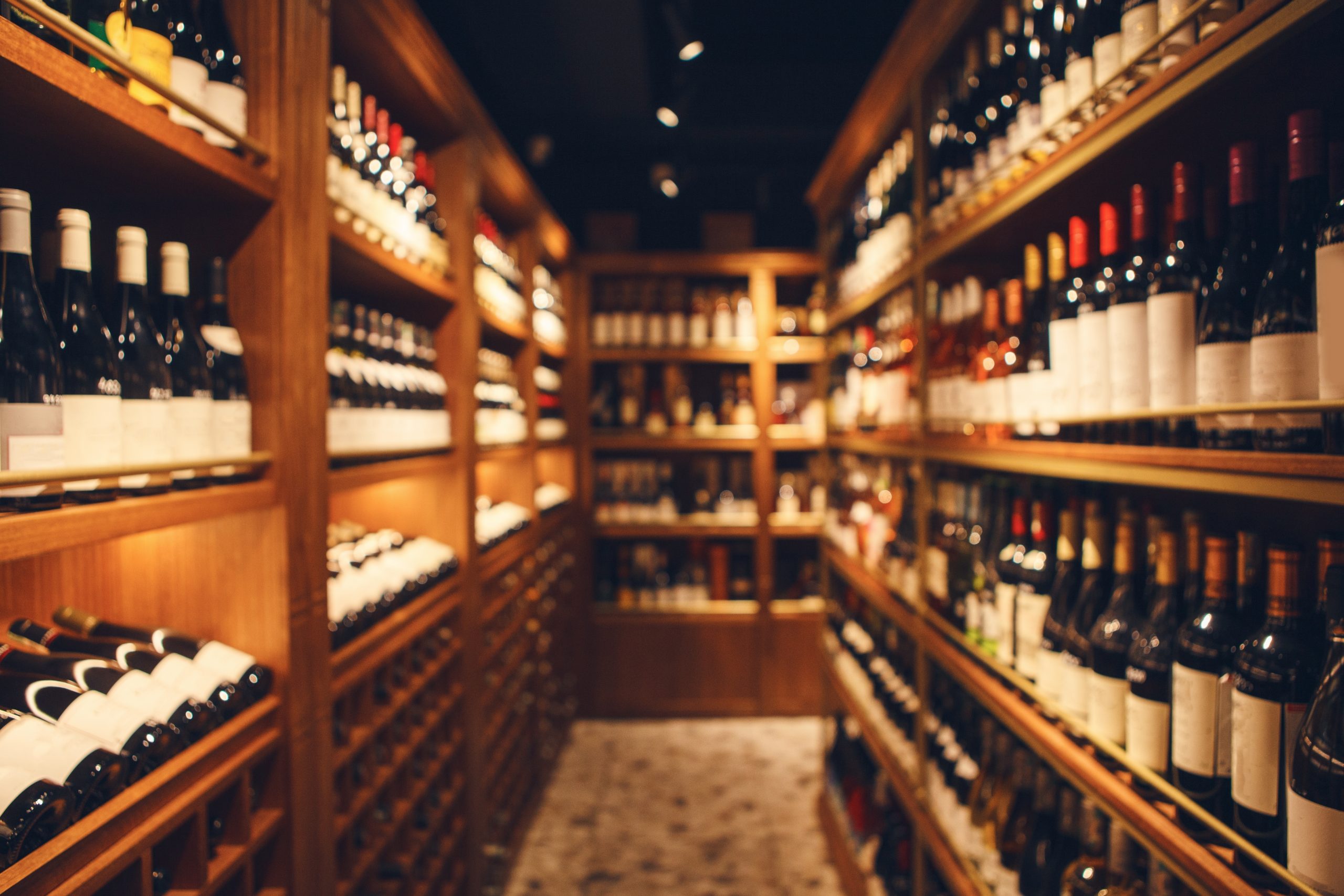 Wide-angle,Interior,Shot,Of,Big,Cellar,In,Wine,Shop,With